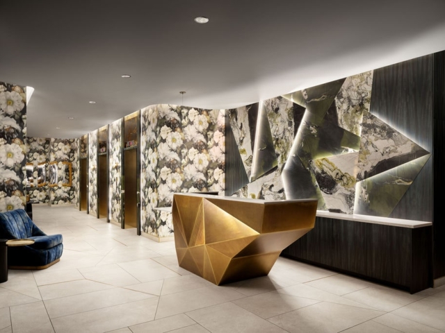 The Dorian lobby with sculptural brass reception desk