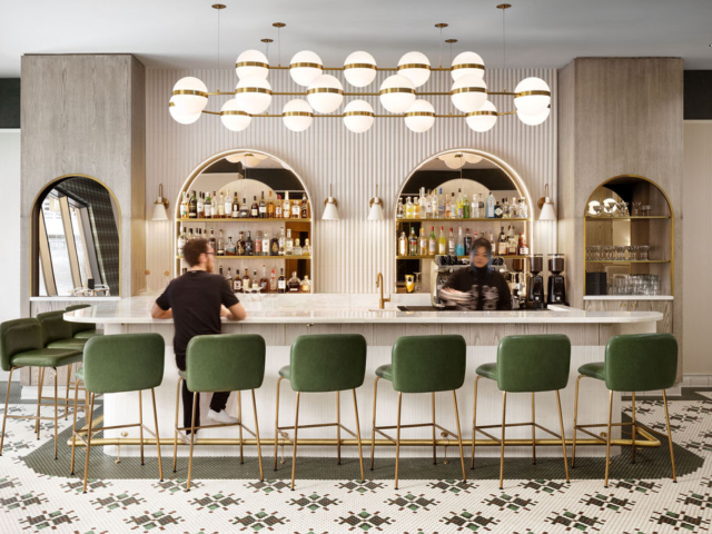 Prologue bar with green stools and arched shelving