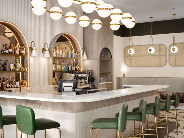 Prologue bar with green stools and marble counter