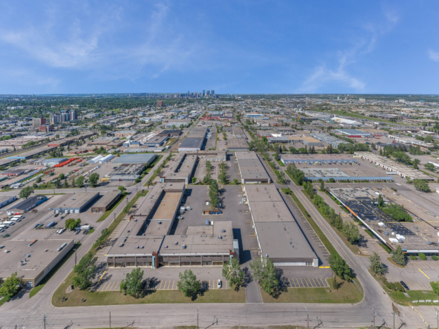 Industrial area with distant downtown skyline